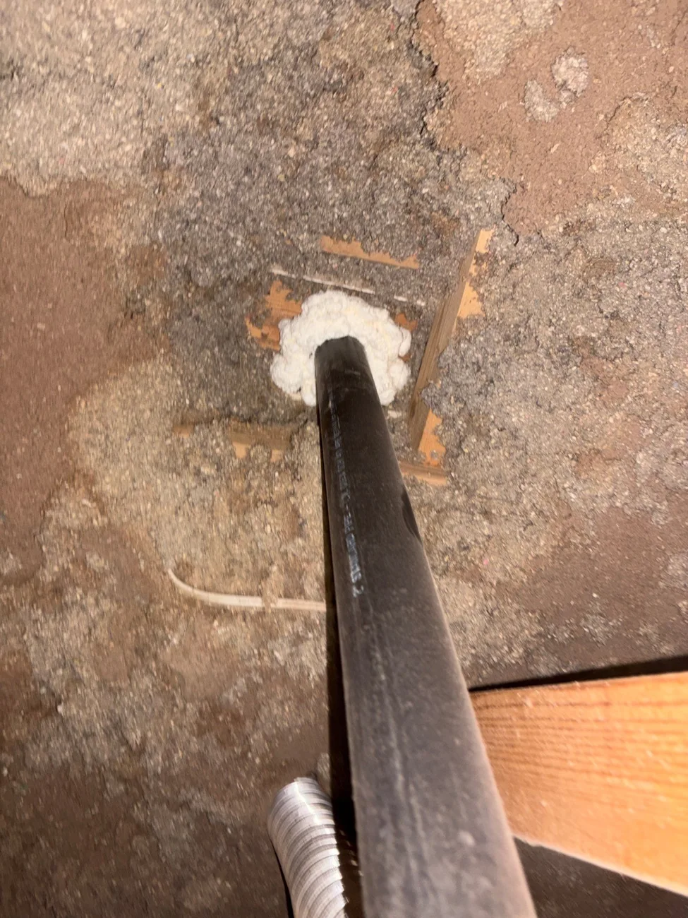 Attic pipe penetration after air sealing