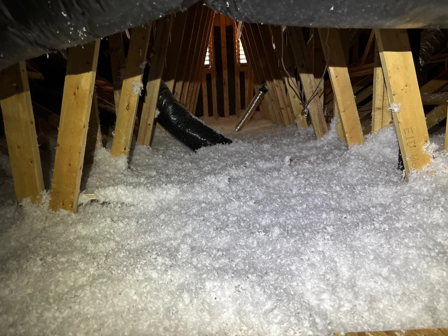 Blown-in fiberglass insulation installed in an Arizona attic