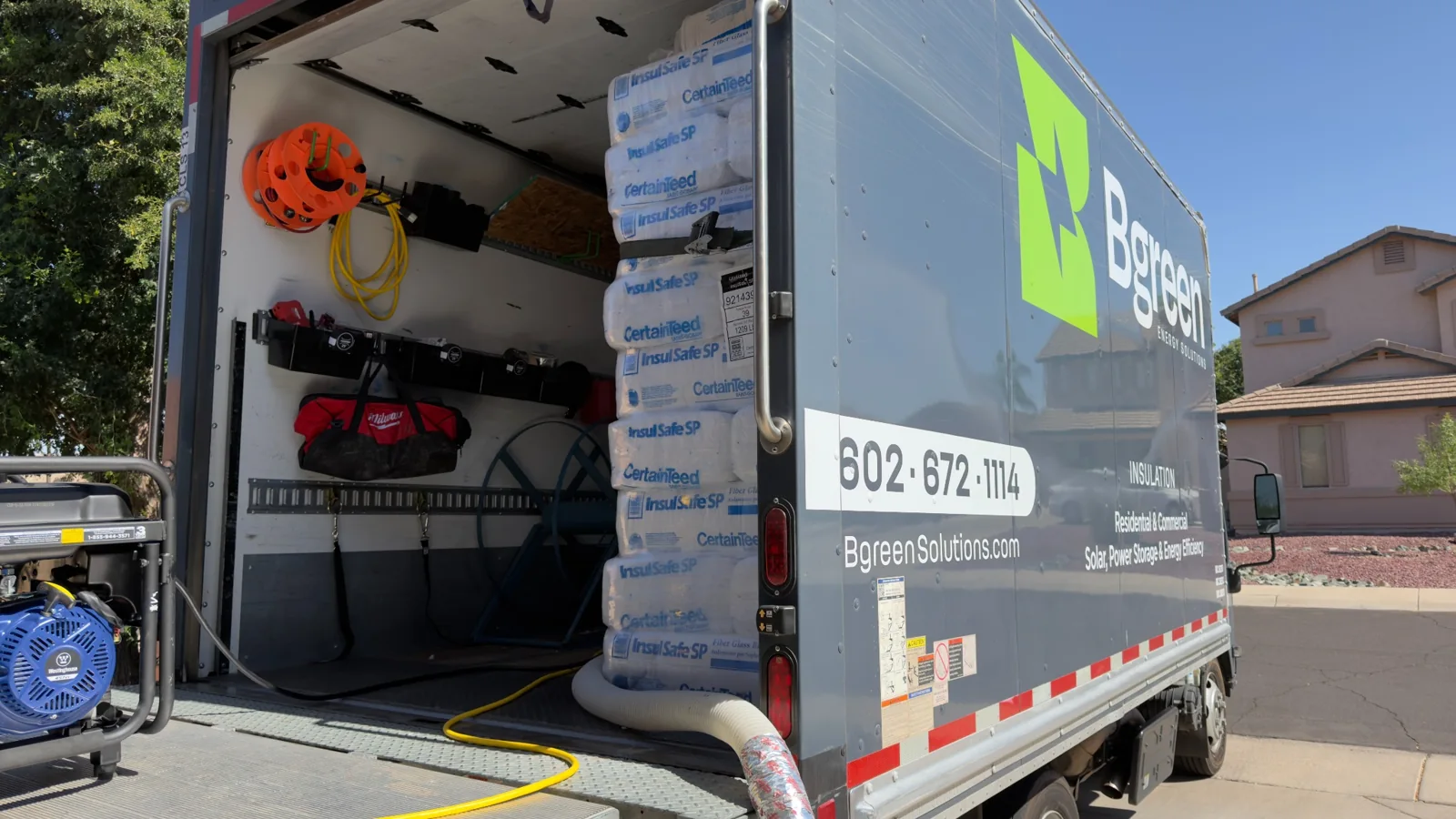 CertainTeed fiberglass insulation bags and equipment in the Bgreen truck