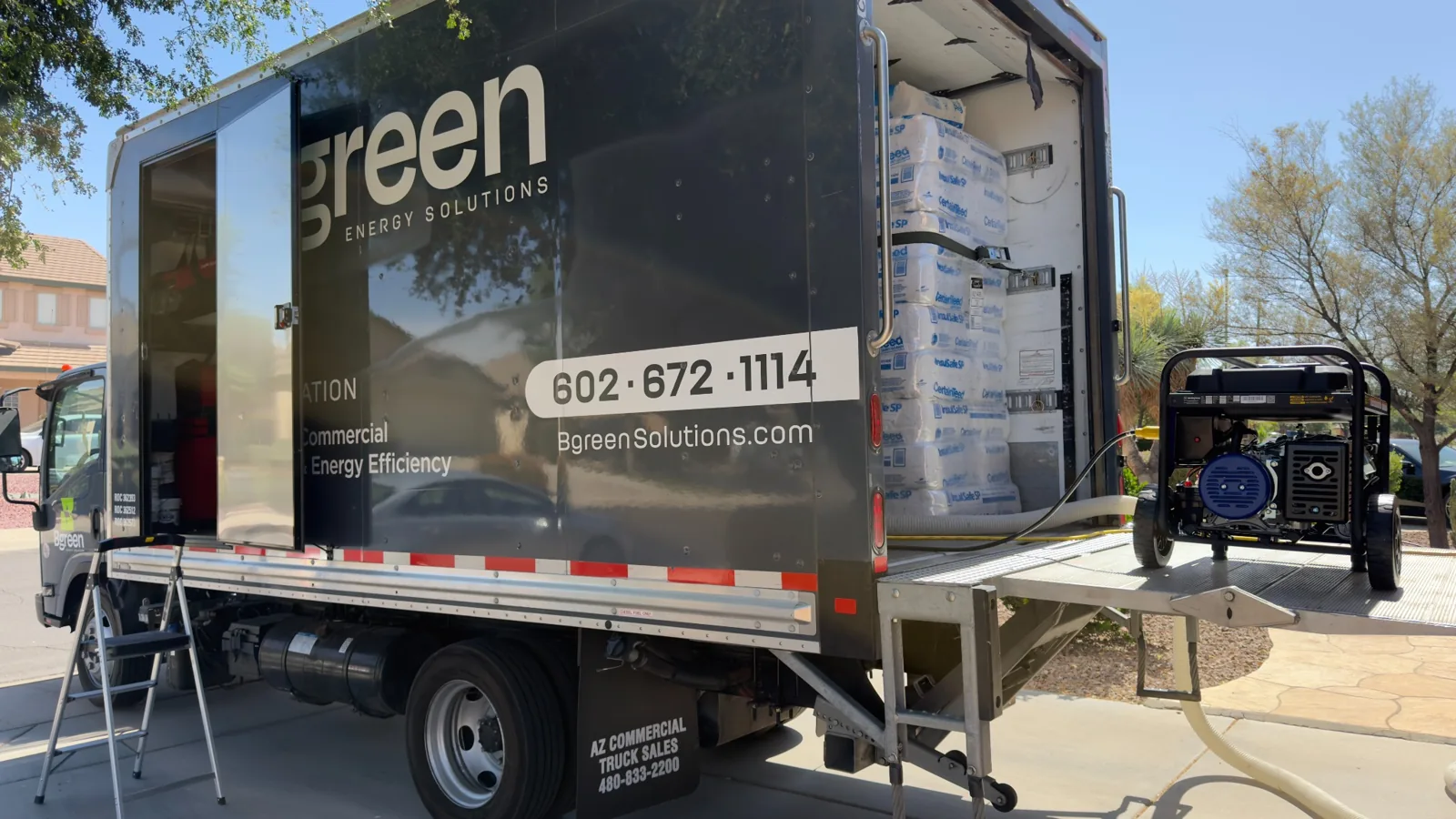 Bgreen Energy Solutions truck with fiberglass insulation and generator set up for an installation